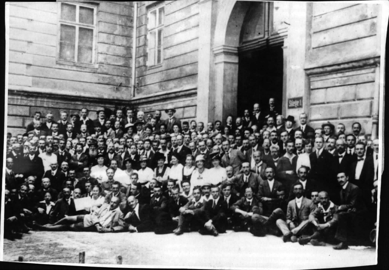 Adolf Hitler at the first meeting of the Austrian Nationalist Party in Salzburg, where he showed for the first time the swastika flag that he designed